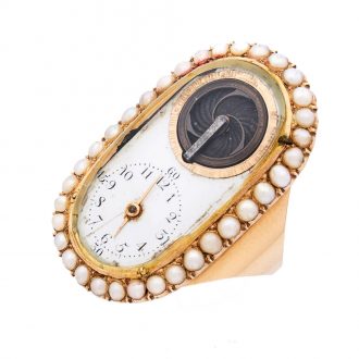 Swiss gold ring watch with half pearls and visible balance Circa 1810