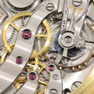 Fine Swiss 18k gold open faced complicated watch Circa 1947