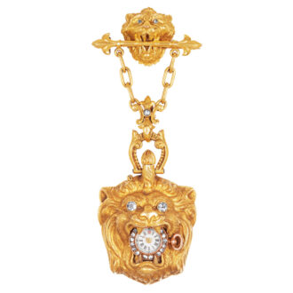 Swiss gold watch in the form of a lion's head Circa 1870 Swiss gold watch in the form of a lion's head Circa 1870