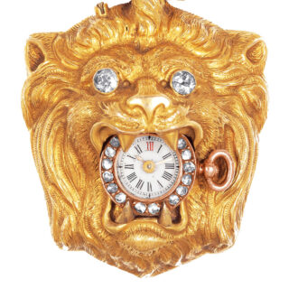 Swiss gold watch in the form of a lion's head Circa 1870 Swiss gold watch in the form of a lion's head Circa 1870