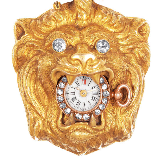Swiss gold watch in the form of a lion's head Circa 1870 Swiss gold watch in the form of a lion's head Circa 1870