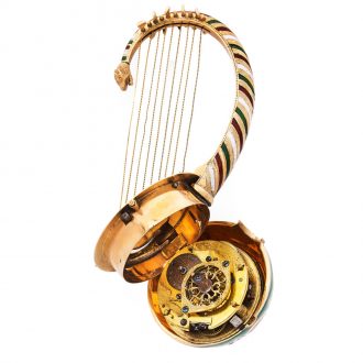 Fine Swiss 18 carat gold and enamel nanga form watch Circa 1820