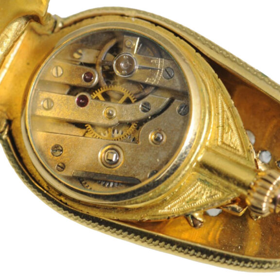 Swiss gold, enamel and diamond scarab form watch Circa 1910 Swiss gold, enamel and diamond scarab form watch Circa 1910