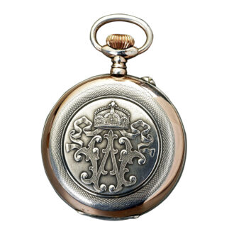 German silver open faced watch with a silver chain Circa 1909