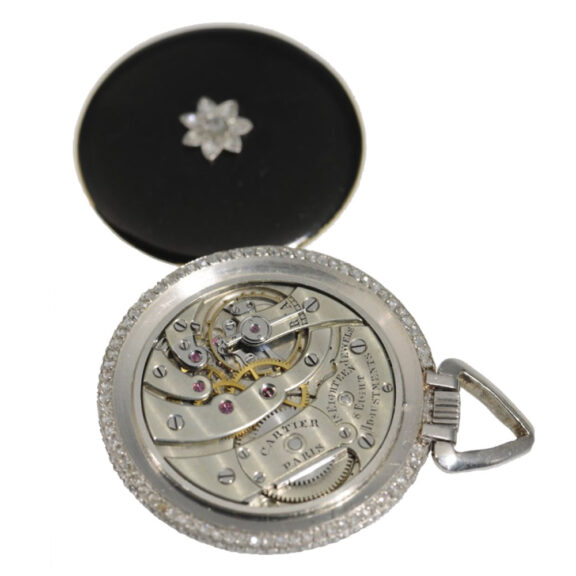 French gold and black enamel open faced watch Circa 1910 French gold and black enamel open faced watch Circa 1910