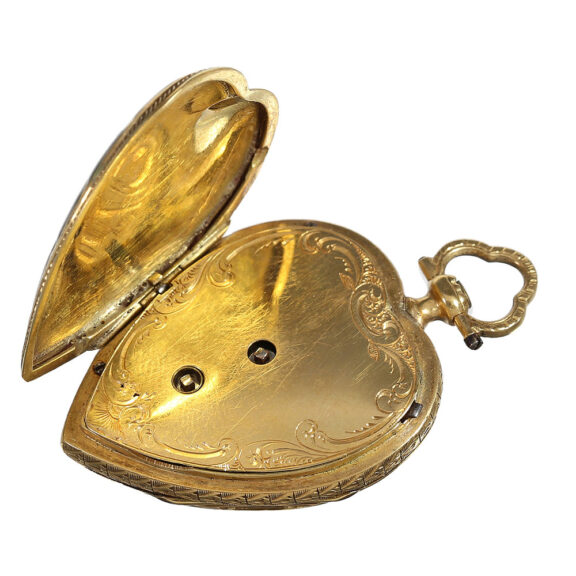 French gold and enamel watch in the shape of a heart Circa 1850 French gold and enamel watch in the shape of a heart Circa 1850