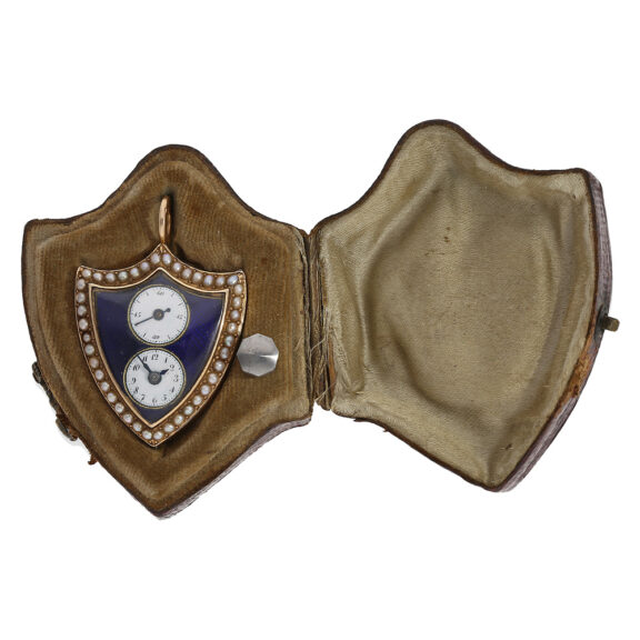 Swiss gold shield-shaped watch with two small dials Circa 1800 Swiss gold shield-shaped watch with two small dials Circa 1800