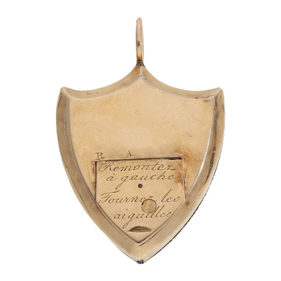 Swiss gold shield-shaped watch with two small dials Circa 1800 Swiss gold shield-shaped watch with two small dials Circa 1800