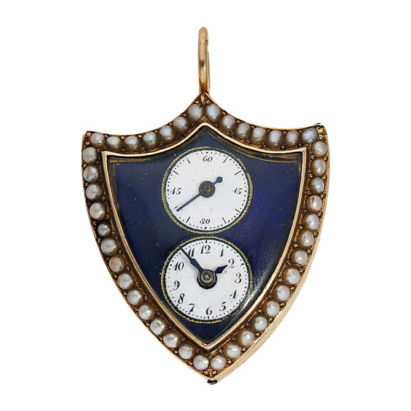 Swiss gold shield-shaped watch with two small dials Circa 1800 Swiss gold shield-shaped watch with two small dials Circa 1800