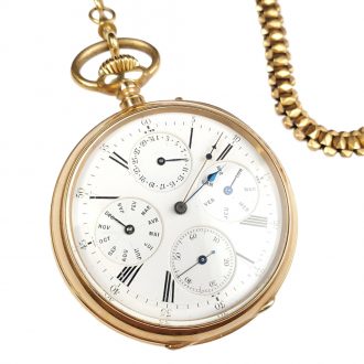 French 18K gold open faced lever watch with calendar Circa 1900