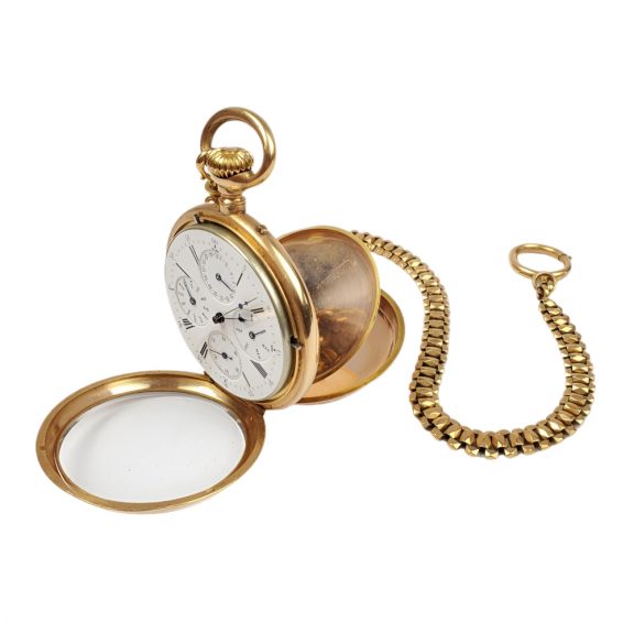 French 18K gold open faced lever watch with calendar Circa 1900 French 18K gold open faced lever watch with calendar Circa 1900