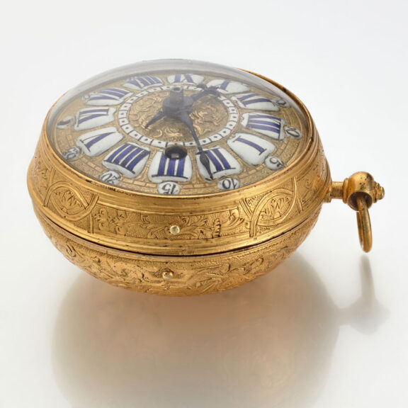 A gilt pocket watch with very thick relief case Circa 1715 A gilt pocket watch with very thick relief case Circa 1715