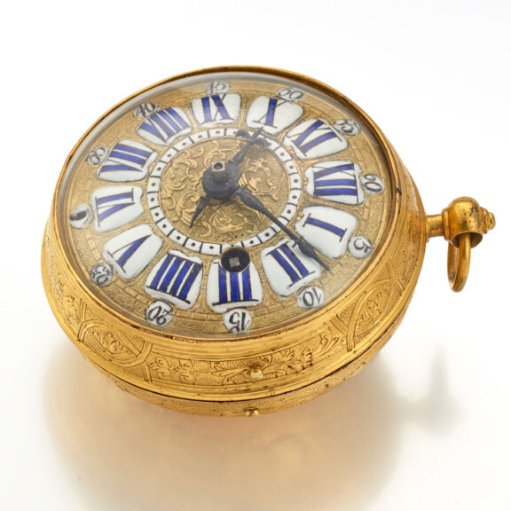 A gilt pocket watch with very thick relief case Circa 1715 A gilt pocket watch with very thick relief case Circa 1715
