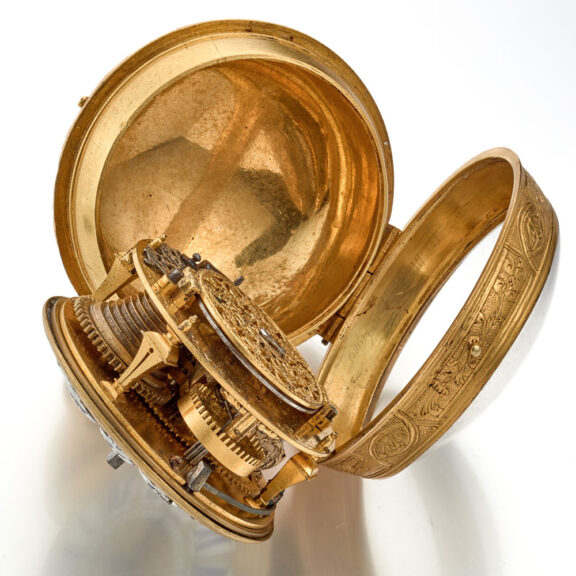 A gilt pocket watch with very thick relief case Circa 1715 A gilt pocket watch with very thick relief case Circa 1715