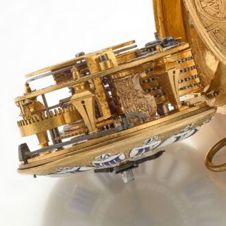 A gilt pocket watch with very thick relief case Circa 1715