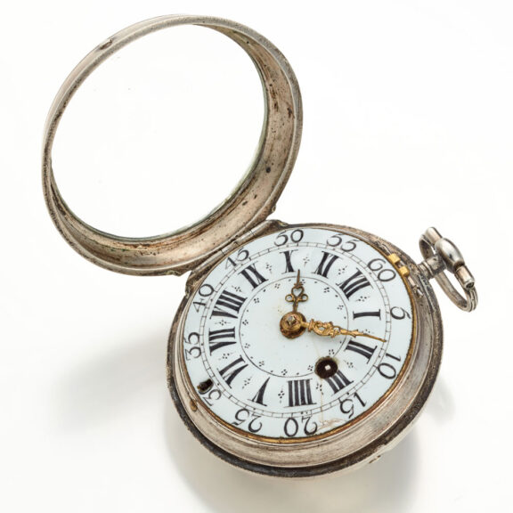 A French oignon with enamel dial in a silver case Circa 1715 A French oignon with enamel dial in a silver case Circa 1715