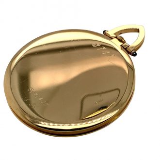 Flat Swiss 18K gold open faced pocket dress watch Circa 1985 Flat Swiss 18K gold open faced pocket dress watch Circa 1985