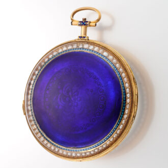 A French 18K gold watch with pearls on both sides Circa 1800