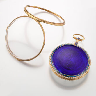 A French 18K gold watch with pearls on both sides Circa 1800