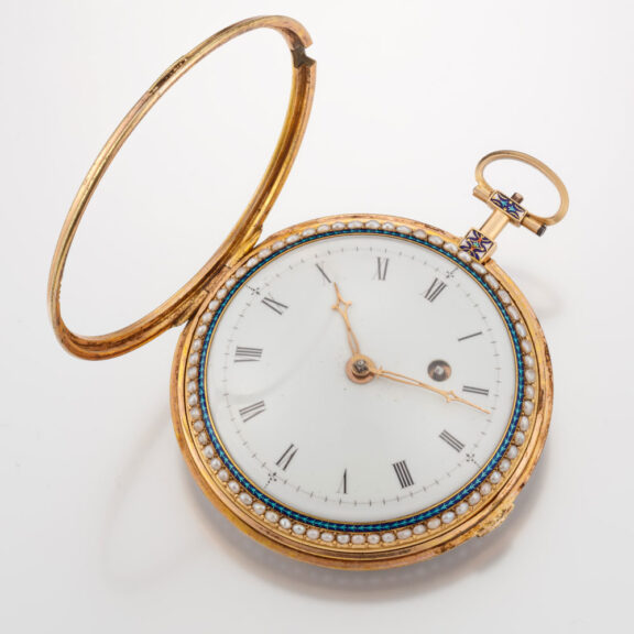 A French 18K gold watch with pearls on both sides Circa 1800 A French 18K gold watch with pearls on both sides Circa 1800