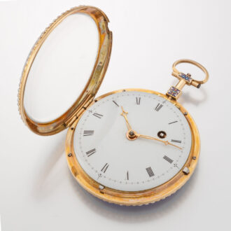 A French 18K gold watch with pearls on both sides Circa 1800