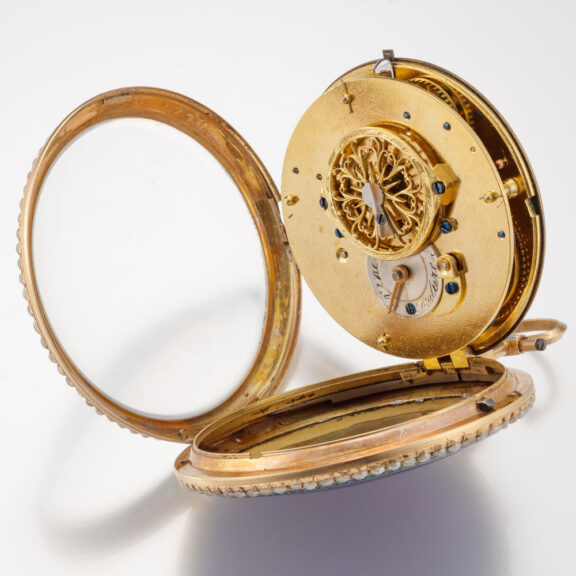 A French 18K gold watch with pearls on both sides Circa 1800 A French 18K gold watch with pearls on both sides Circa 1800