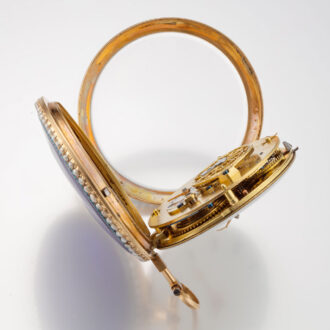 A French 18K gold watch with pearls on both sides Circa 1800