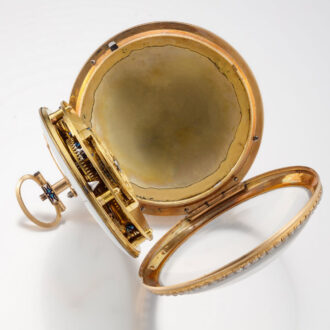 A French 18K gold watch with pearls on both sides Circa 1800