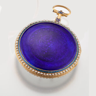 A French 18K gold watch with pearls on both sides Circa 1800