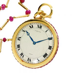 Rare French 18k gold ruby-set watch with chain Circa 1925
