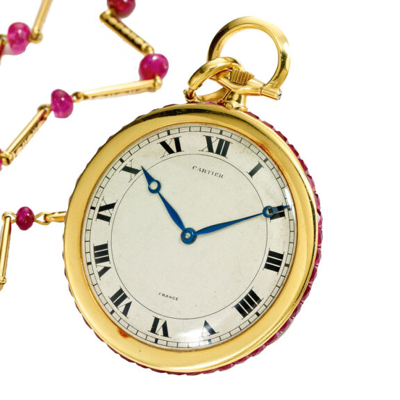 Rare French 18k gold ruby-set watch with chain Circa 1925