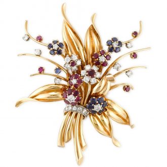 Swiss gold, sapphire, and diamond-set brooch watch Circa 1960