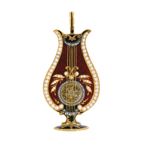 Swiss gold enamel and pearl set lyre-form watch Circa 1810 Swiss gold enamel and pearl set lyre-form watch Circa 1810