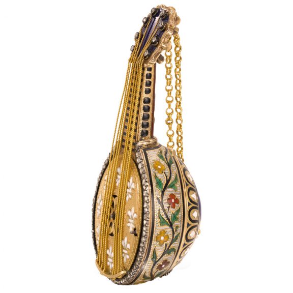 Austrian mandolin form watch with musical movement Circa 1895 Austrian mandolin form watch with musical movement Circa 1895