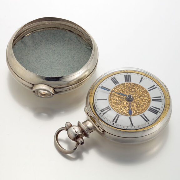 An unusual English silver pair cased verge watch Circa 1859 An unusual English silver pair cased verge watch Circa 1859