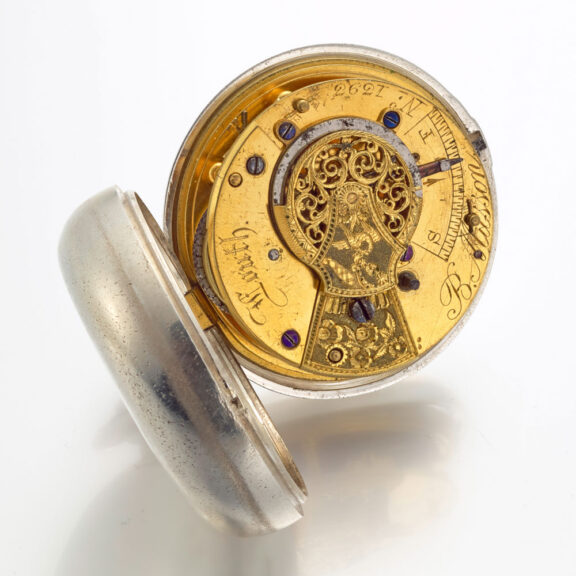 An unusual English silver pair cased verge watch Circa 1859 An unusual English silver pair cased verge watch Circa 1859