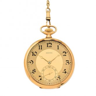 Swiss flat 18K gold pocket watch with vest chain Circa 1925