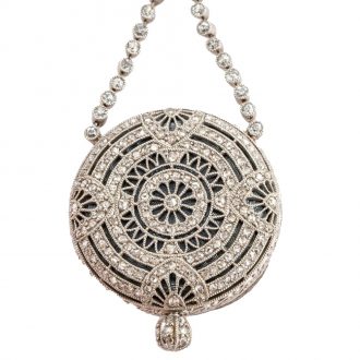 Swiss open faced keyless miniature lady's pendant watch Circa 1910