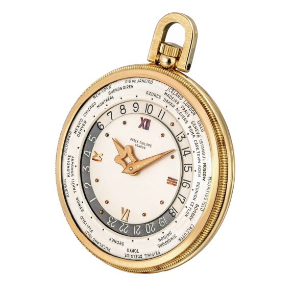 Swiss pink gold World Time open faced lever dress watch Circa 1964 Swiss pink gold World Time open faced lever dress watch Circa 1964