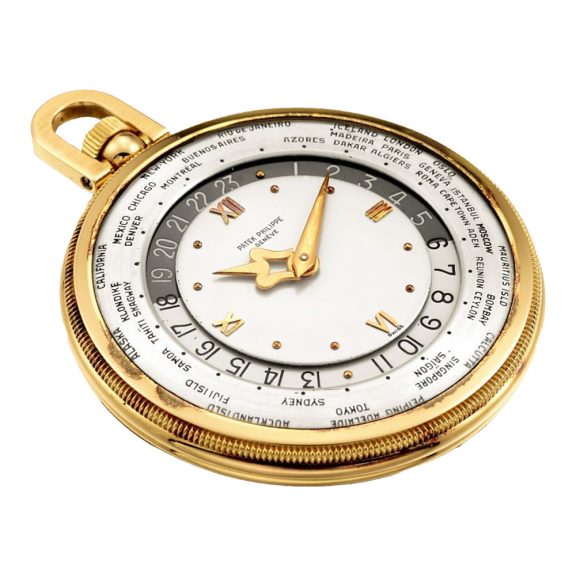 Swiss pink gold World Time open faced lever dress watch Circa 1964 Swiss pink gold World Time open faced lever dress watch Circa 1964