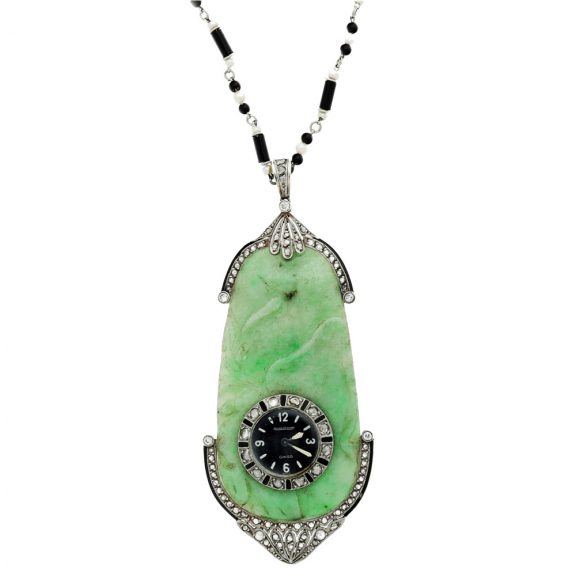 Swiss platinum, jade, and diamond set pendant watch Circa 1925 Swiss platinum, jade, and diamond set pendant watch Circa 1925