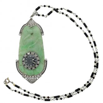 Swiss platinum, jade, and diamond set pendant watch Circa 1925
