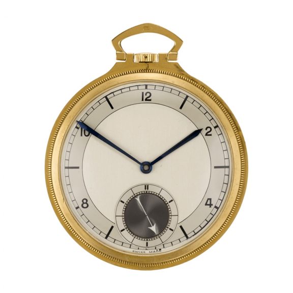 Slim, handsome Swiss gold keyless open faced dress watch Circa 1943