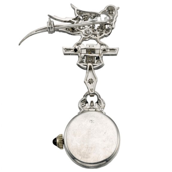 Swiss white gold and diamond set lever lapel watch Circa 1920 Swiss white gold and diamond set lever lapel watch Circa 1920