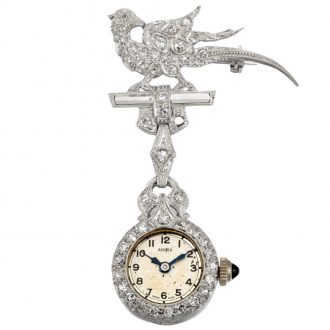 Swiss white gold and diamond set lever lapel watch Circa 1920