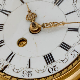 An English 20 carat date verge in repousse pair cases Circa 1740