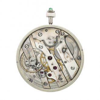 Swiss onyx, platinum and emerald set lever watch Circa 1925