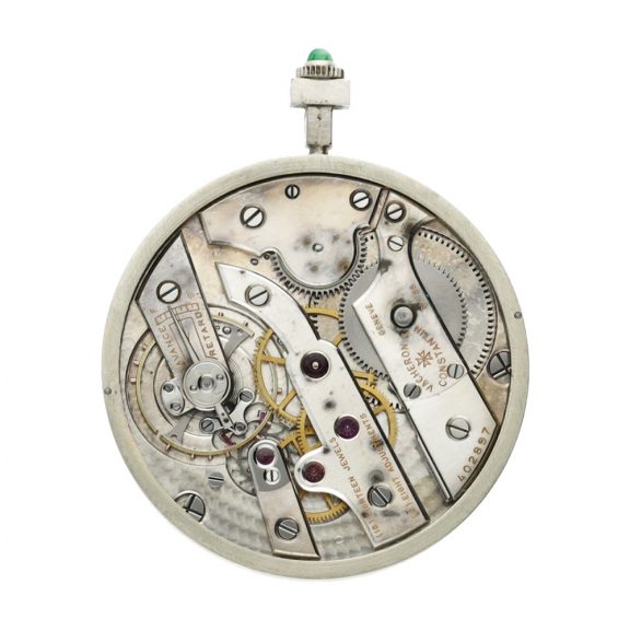 Swiss onyx, platinum and emerald set lever watch Circa 1925 Swiss onyx, platinum and emerald set lever watch Circa 1925