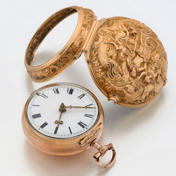 English gold repousse watch with protective outer Circa 1762 English gold repousse watch with protective outer Circa 1762
