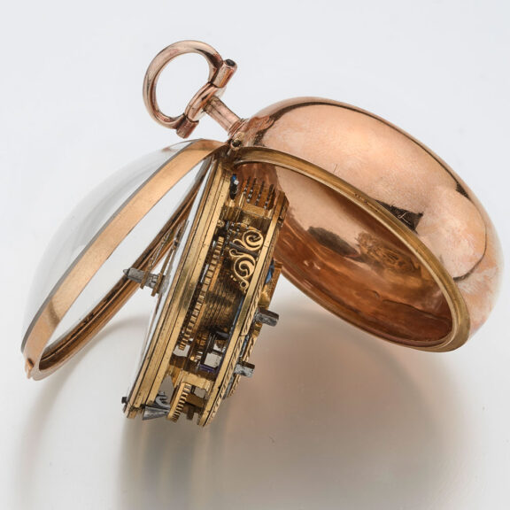 English gold repousse watch with protective outer Circa 1762 English gold repousse watch with protective outer Circa 1762